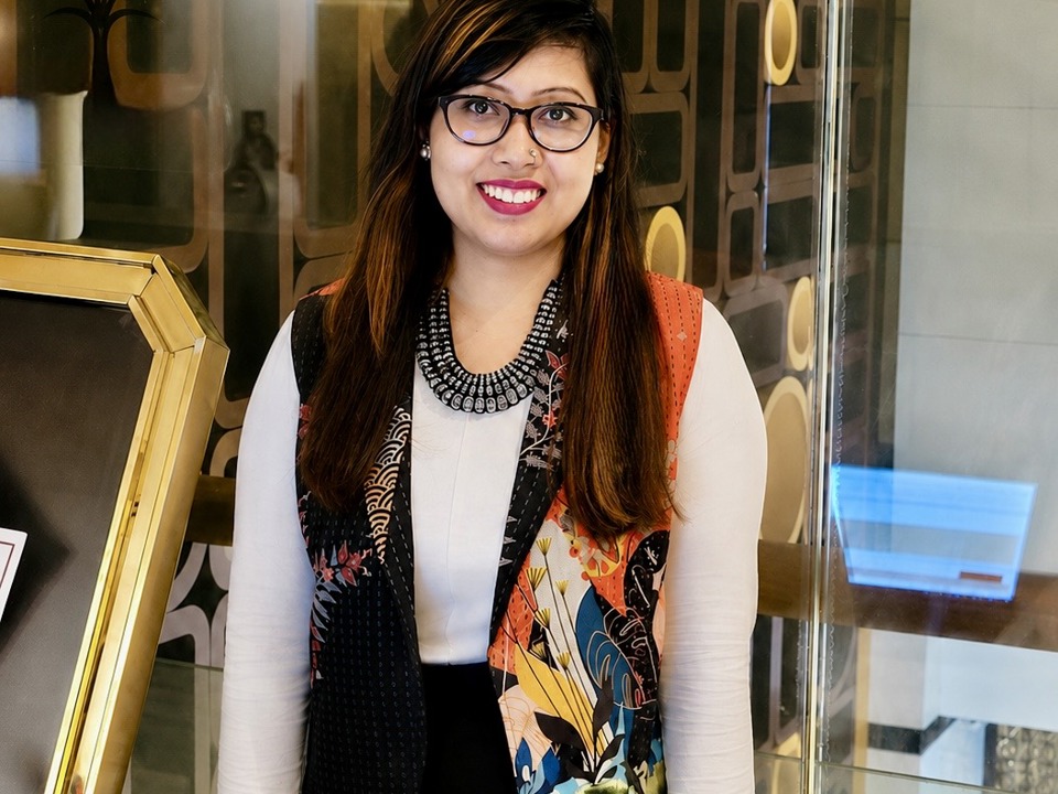 IOSH member Nashia Jahan standing in a modern office space
