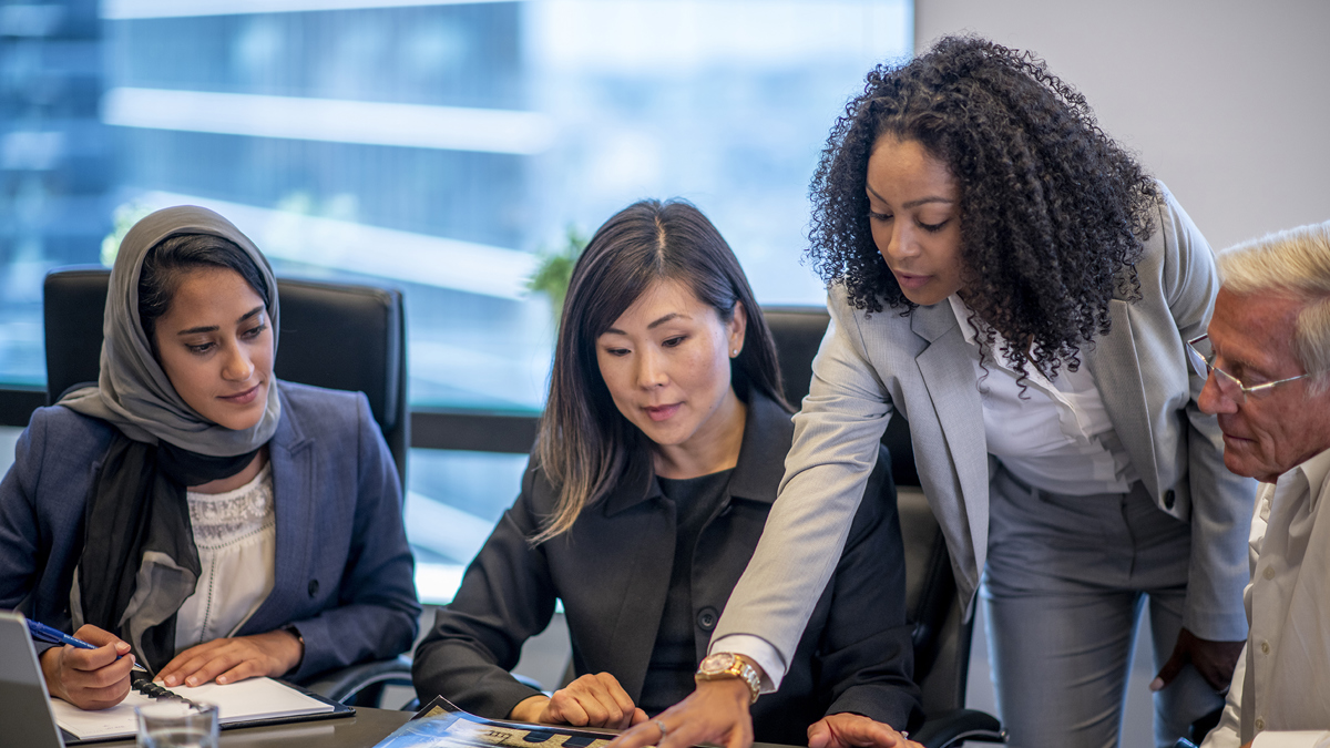 People together around a desk
