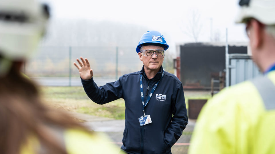 Man in high-viz outdoors