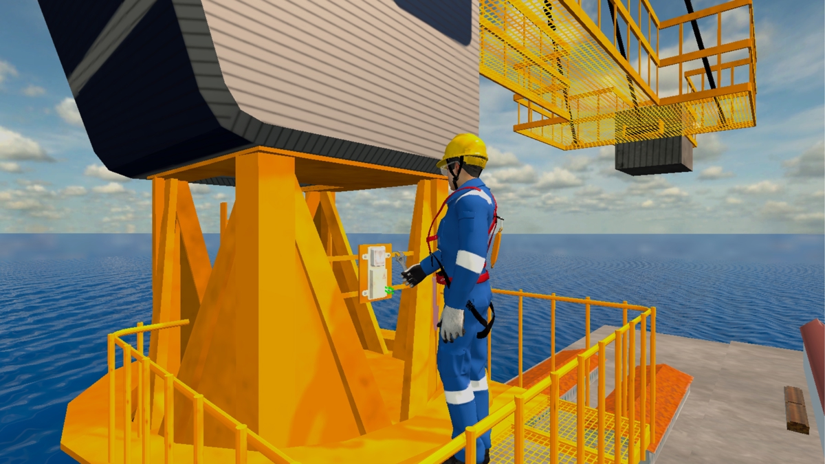 VR training scene on an offshore platform. A worker in blue safety gear stands on a yellow structure operating a control panel near a large crane component. The ocean and partly cloudy sky are visible in the background.