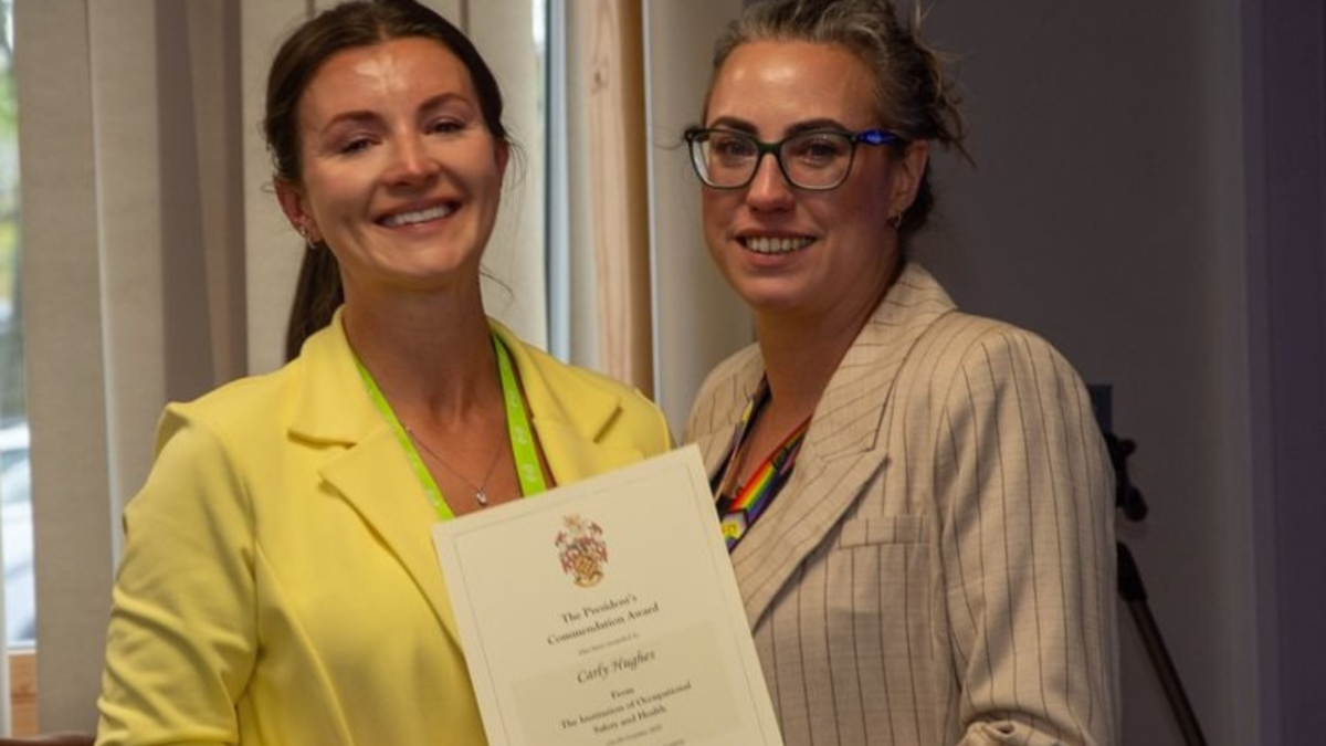 Carly Hughes receiving her President’s Commendation Award